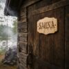 Savusauva_pienempi_saunakyltti Ovikyltti Sauna 18x12 cm gootti